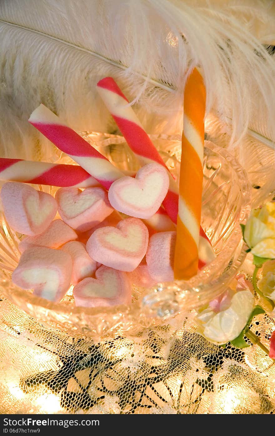 Pink heart marshmallow and sweet in bowl