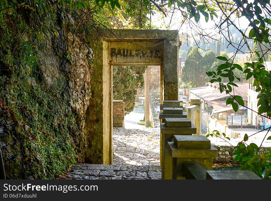 Stone arch near a waterfall in New Athos