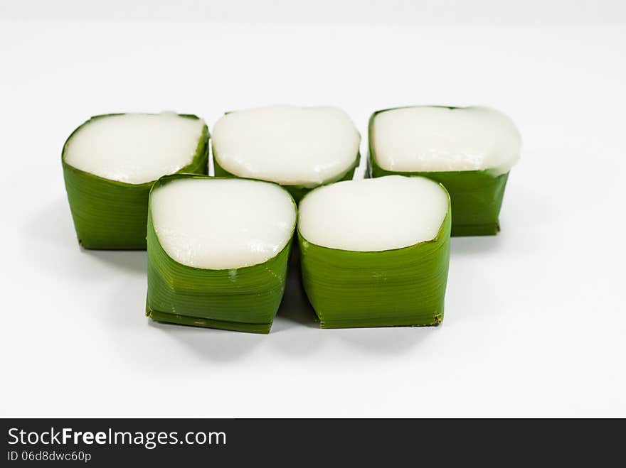 Thai Dessert sweet Coconut Milk on Banana leaf (Kanom Tako) on white background. Thai Dessert sweet Coconut Milk on Banana leaf (Kanom Tako) on white background