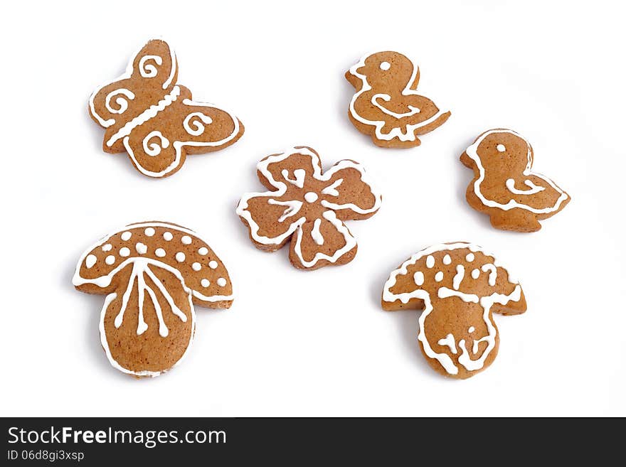 Various Christmas decorated gingerbread on white background. Various Christmas decorated gingerbread on white background