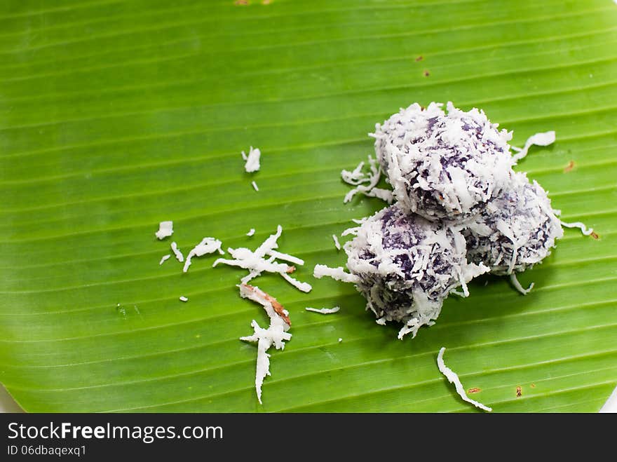 Thai dessert sweet boiled ball , roll over the grated coconut