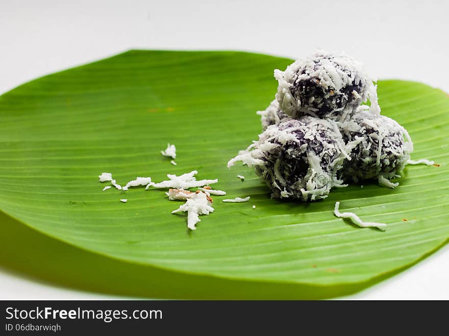 Thai dessert sweet boiled ball , roll over the grated coconut