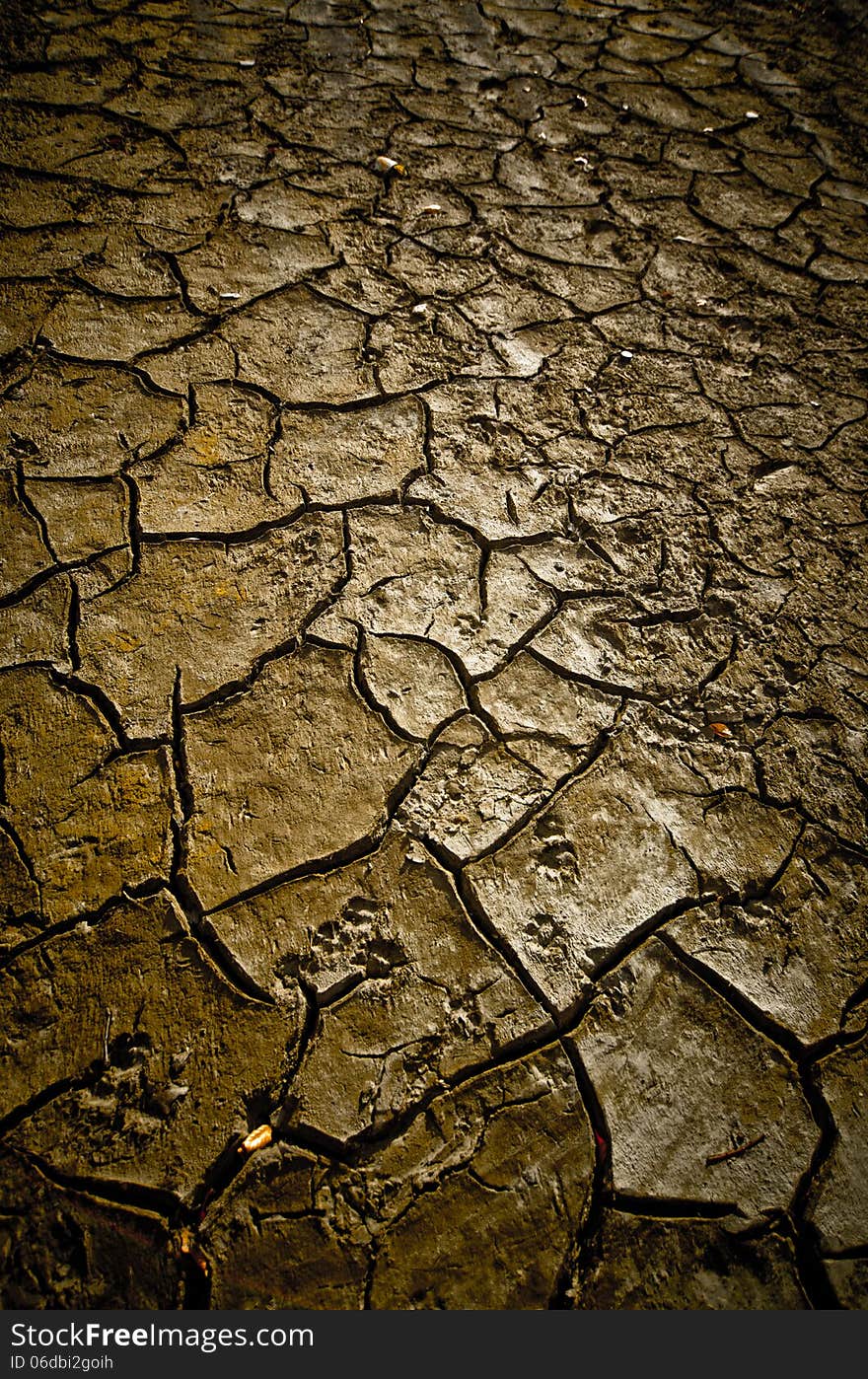 Cracked mud details texture with large cracks and very dried mud. Cracked mud details texture with large cracks and very dried mud