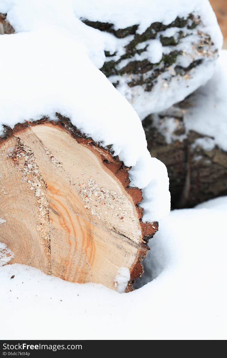 Closeup of converted timber under snow. Nice background. Closeup of converted timber under snow. Nice background