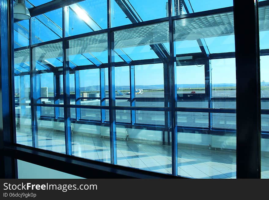 A photo of blue window frame in airport