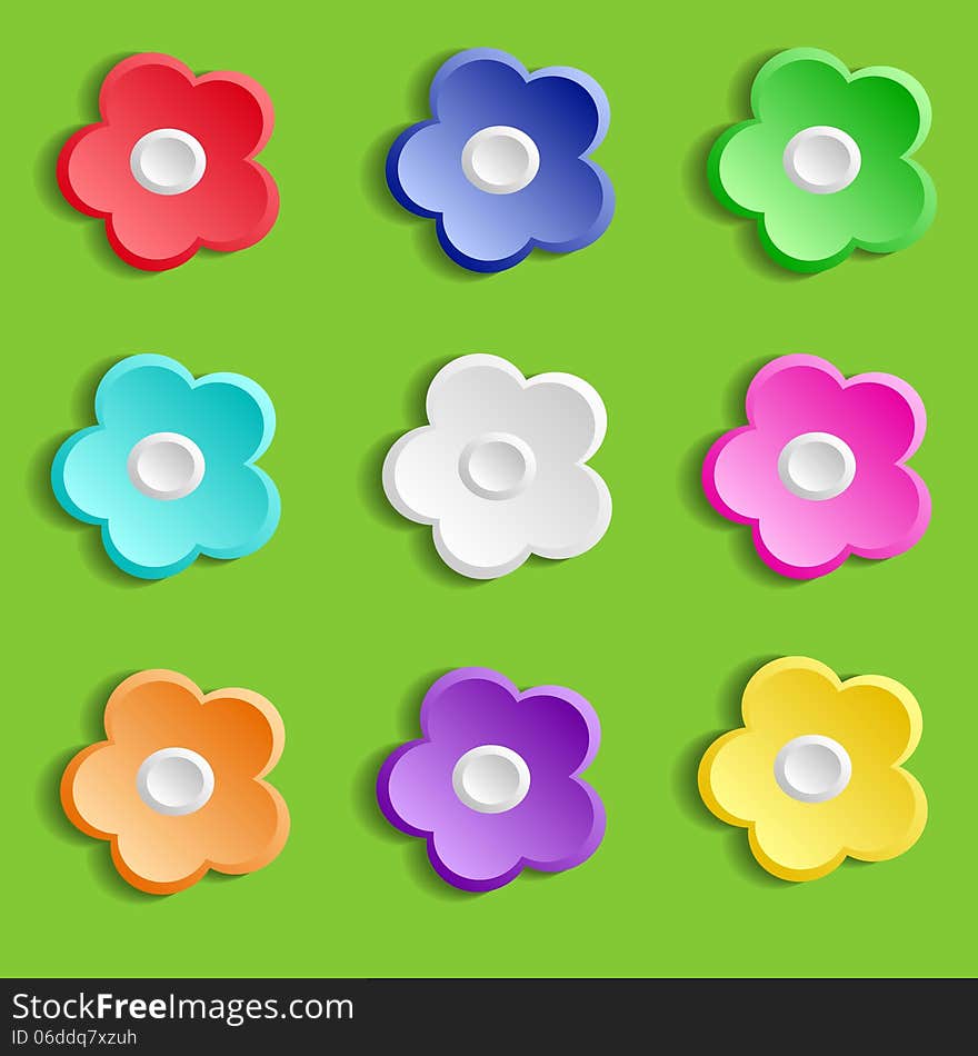 Set of paper flowers on green background