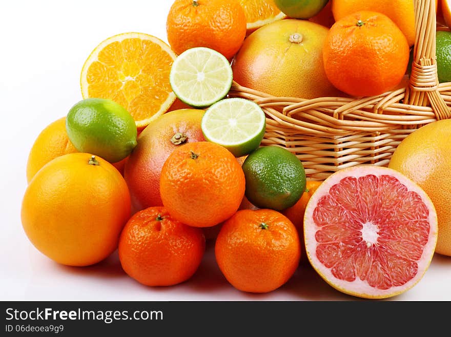 Mixed citrus fruit in wicker basket