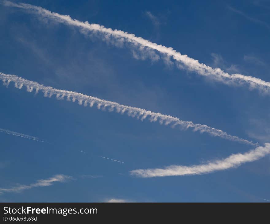 Vapor Trails in the clear blue sky.