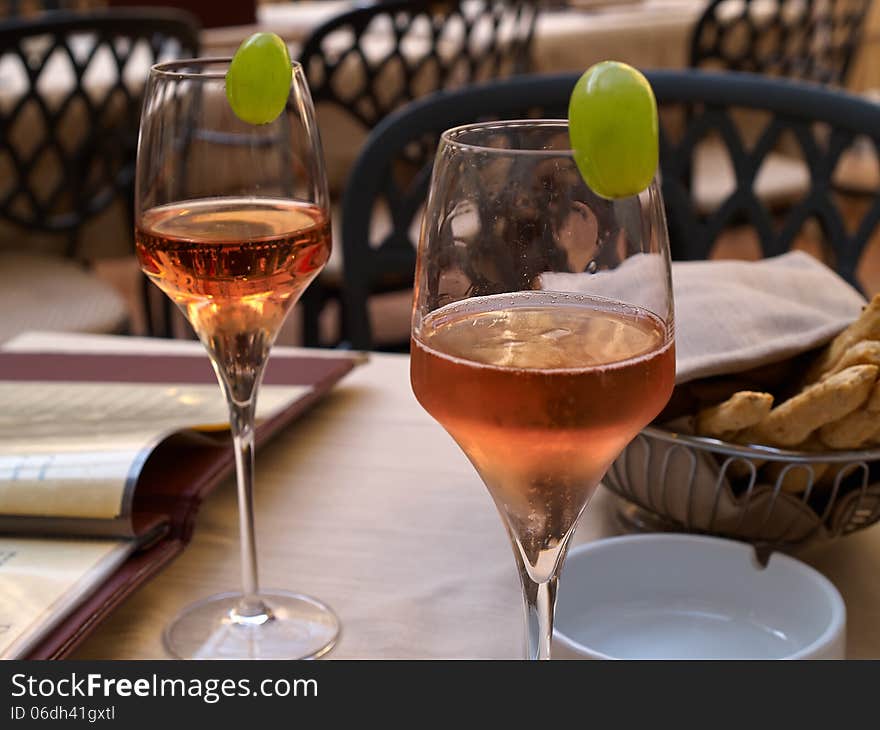 Spritz aperitif served with Grissini in a restaurant in Venice. Spritz aperitif served with Grissini in a restaurant in Venice