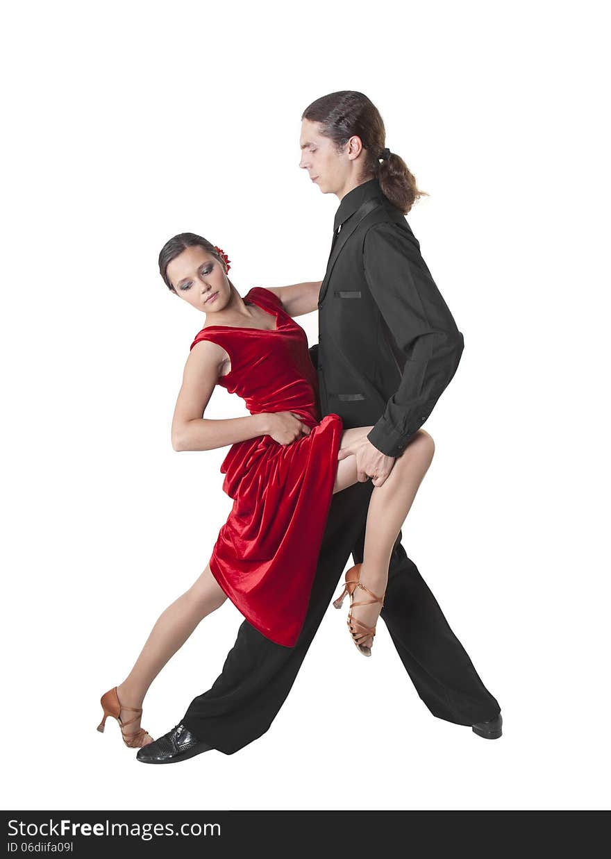 Young couple dancing tango isolated over white