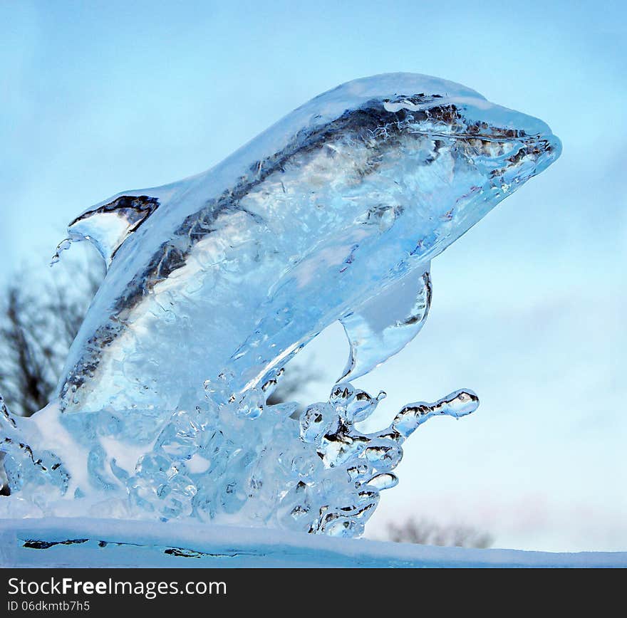 Light blue ice dolphin sculpture