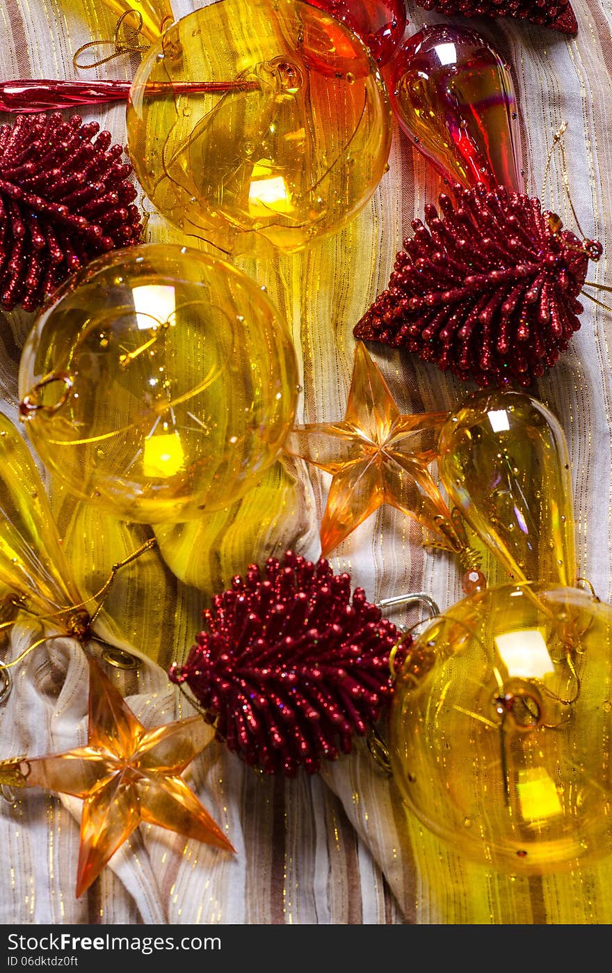 Old glass Christmas ornaments on festive cloth