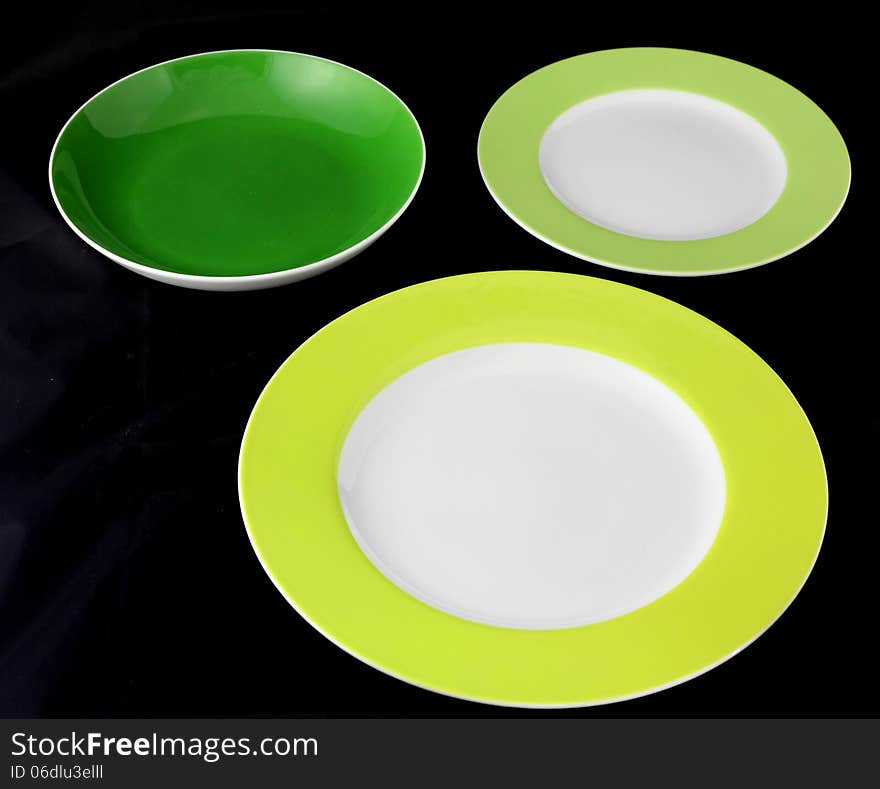 Hand carved bowls- green on a black background. Hand carved bowls- green on a black background