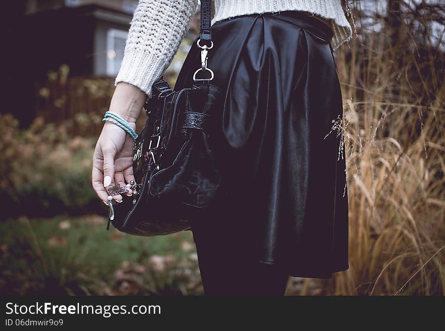 Beautiful fashion woman with silver jewelary on hand