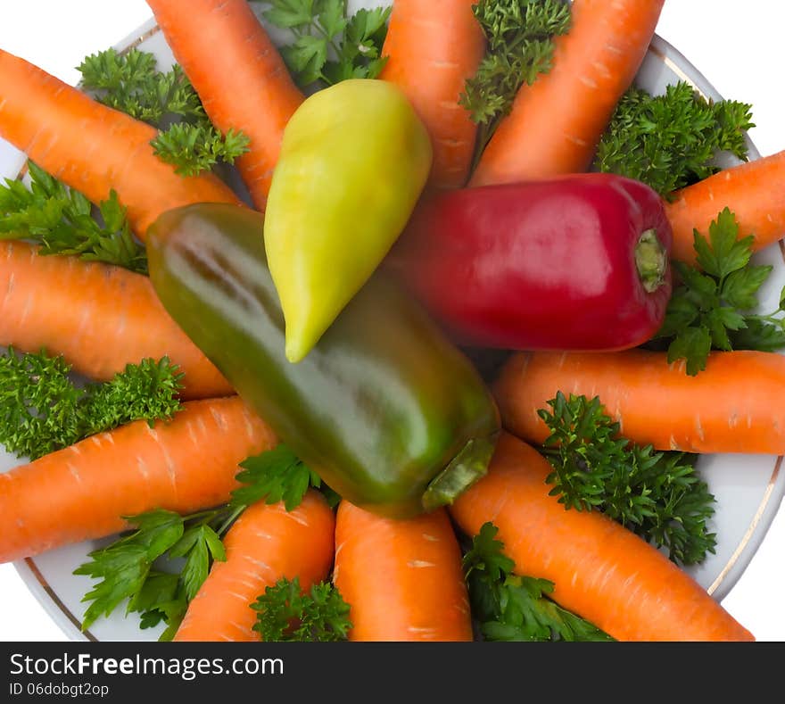 Carrot, Onion And Parsley On The Plate On A White Background.