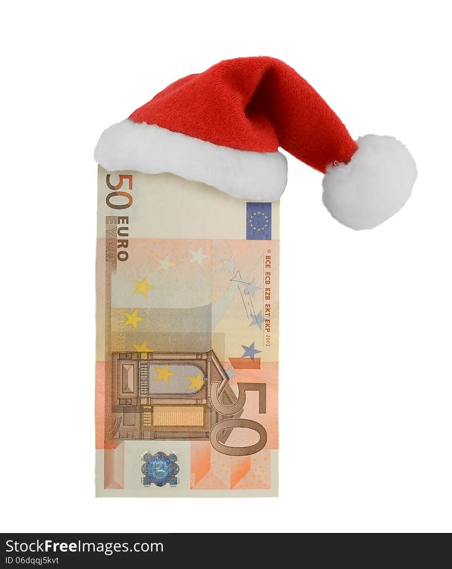 European currency and Santa Claus red hat isolated on white background