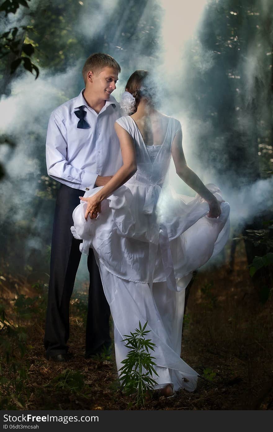 A young beautifu couple in a forest