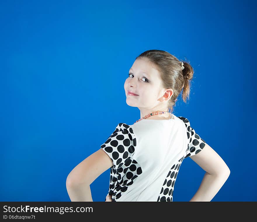 Beautiful Girl On A Blue Background