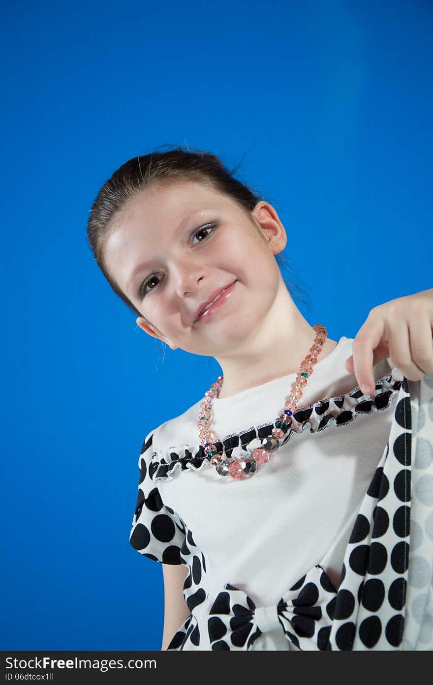 Beautiful Girl On A Blue Background