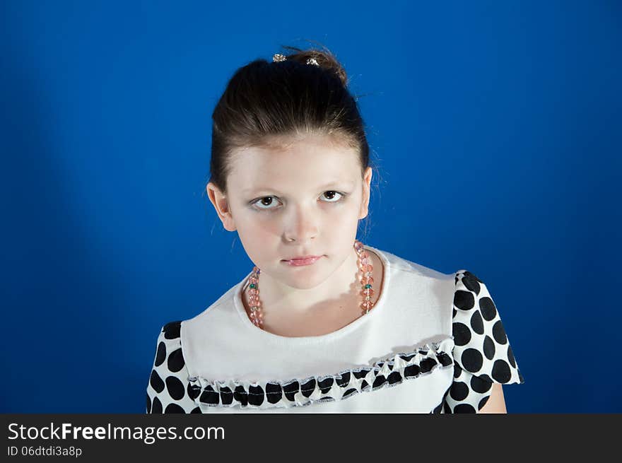 Beautiful Girl On A Blue Background