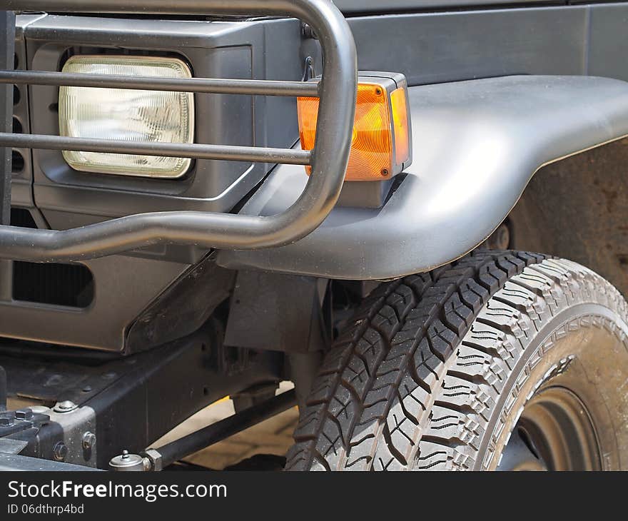 A grey 4x4 off-road car - Detail. A grey 4x4 off-road car - Detail