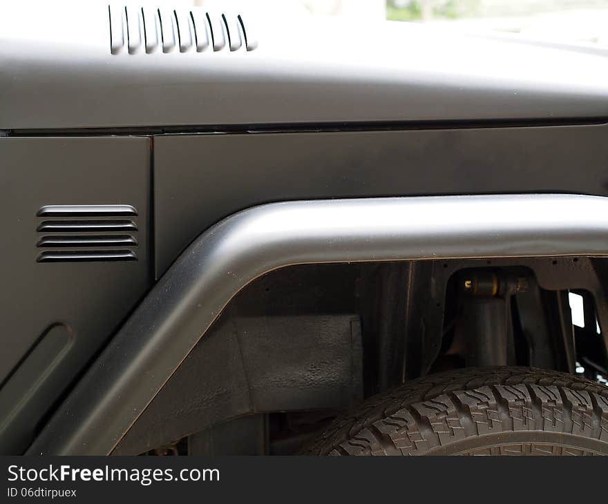 A grey 4x4 off-road car - Detail. A grey 4x4 off-road car - Detail