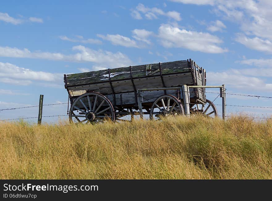 Horse drawn wagon on a hill