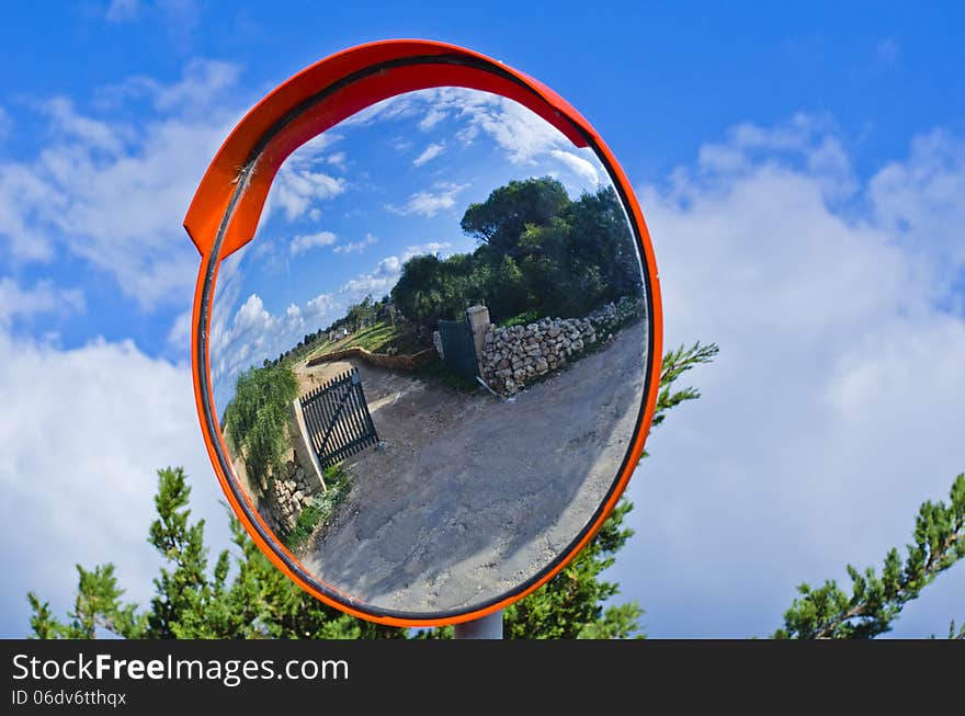 A mirror view of an entrance to a farmhouse in the maltese countryside. A mirror view of an entrance to a farmhouse in the maltese countryside