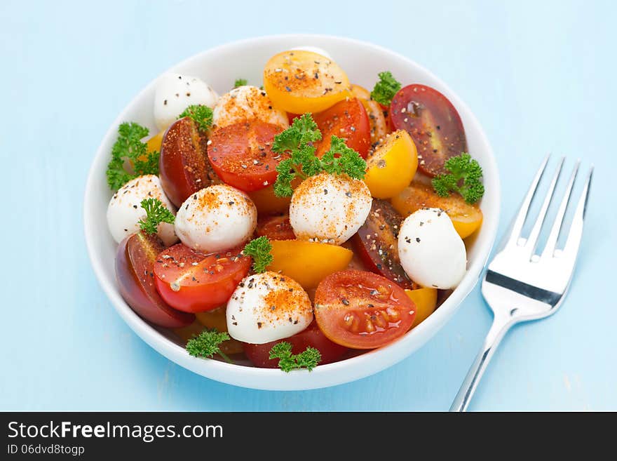 Bowl Of Salad With Mozzarella, Herbs And Colorful Cherry Tomato