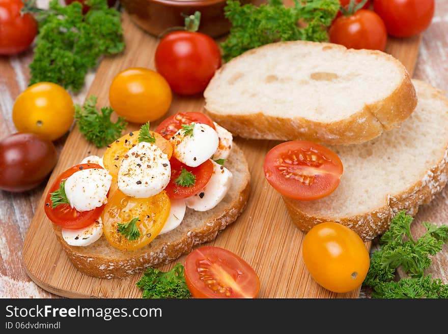 Ciabatta with mozzarella and colorful cherry tomatoes