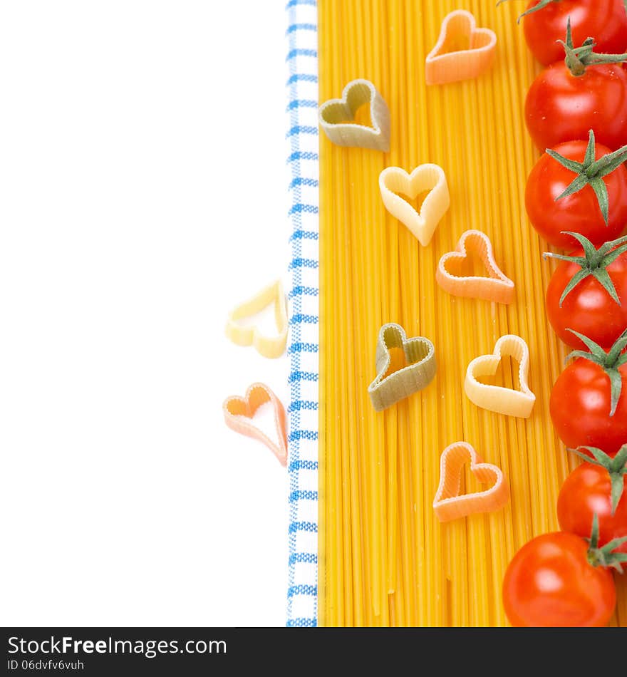 Spaghetti, pasta in the form of hearts and cherry tomatoes, concept, isolated on white