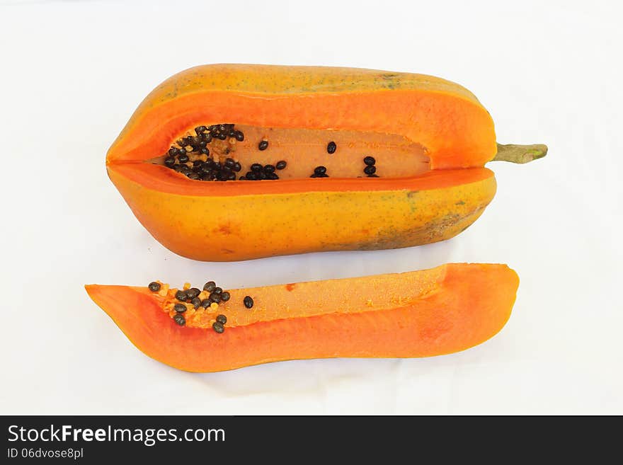 Papaya sliced isolated and cut into pieces