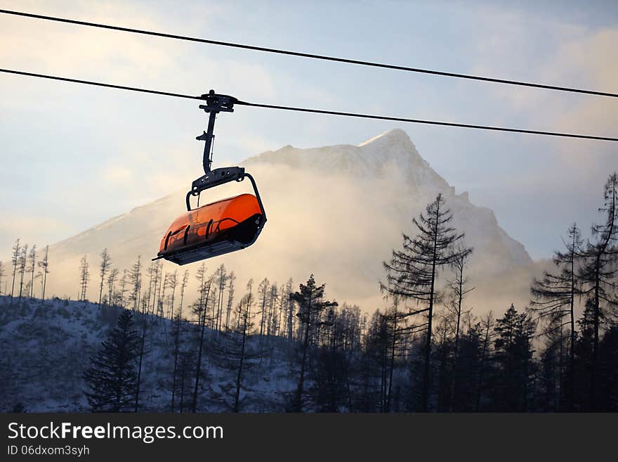 Cabin mountain lift on the mountain background