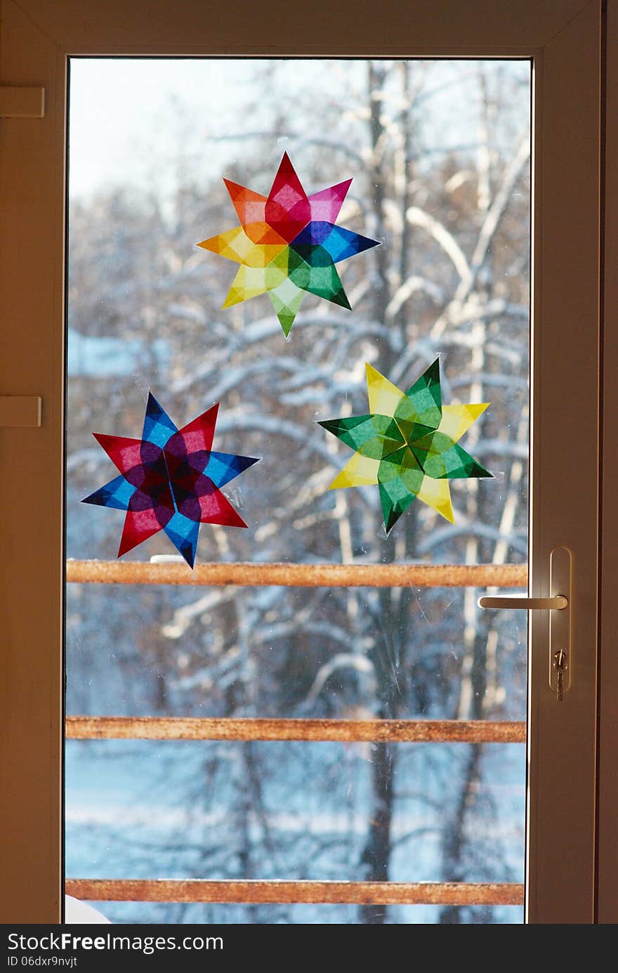 Window decorated with paper stars. Window decorated with paper stars