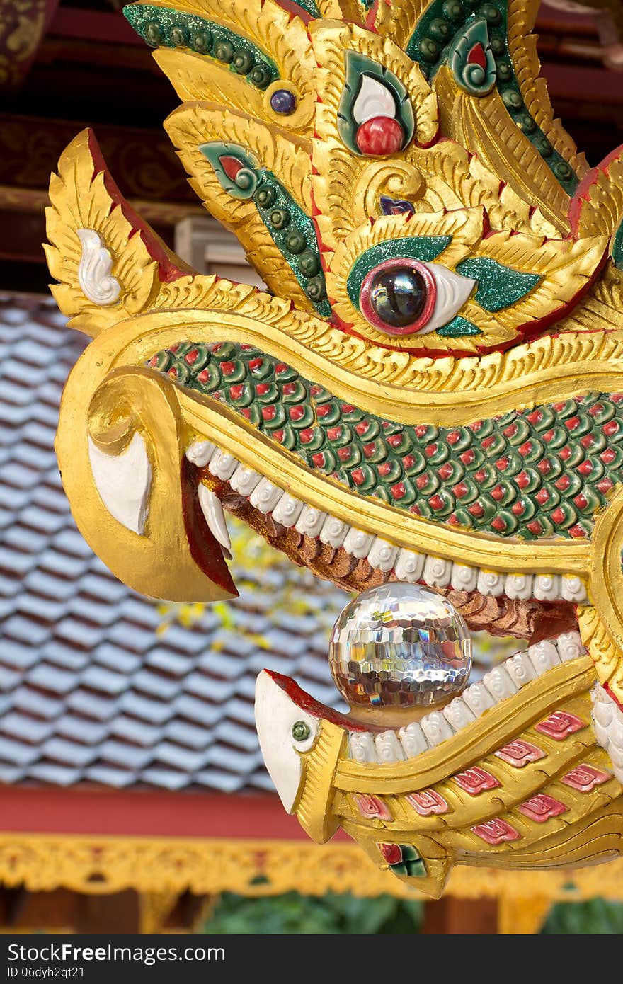 Naga face with crystal in mouth