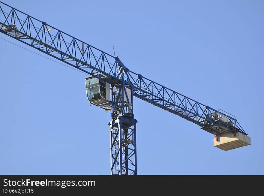 Tower crane near his cabin. Tower crane near his cabin