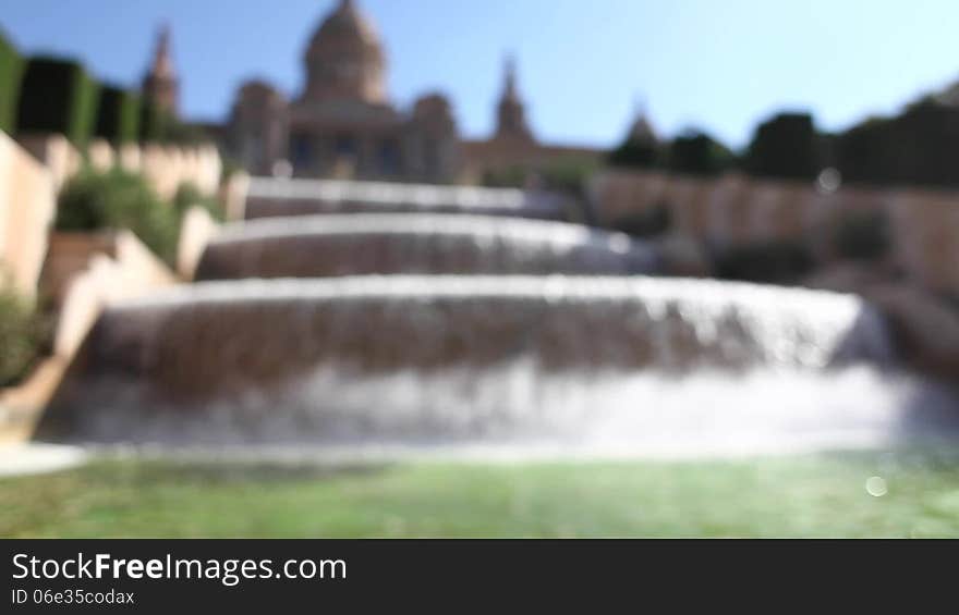 Beautiful falling fountain situated in front of the Museu Nacional d'Art de Catalunya (National Art Museum of Catalunya) with original audio in a sunny day with clear sky and perfect weather conditions. Excelent touristic attraction of Barcelona situated on Monjuc Hill. Beautiful falling fountain situated in front of the Museu Nacional d'Art de Catalunya (National Art Museum of Catalunya) with original audio in a sunny day with clear sky and perfect weather conditions. Excelent touristic attraction of Barcelona situated on Monjuc Hill.