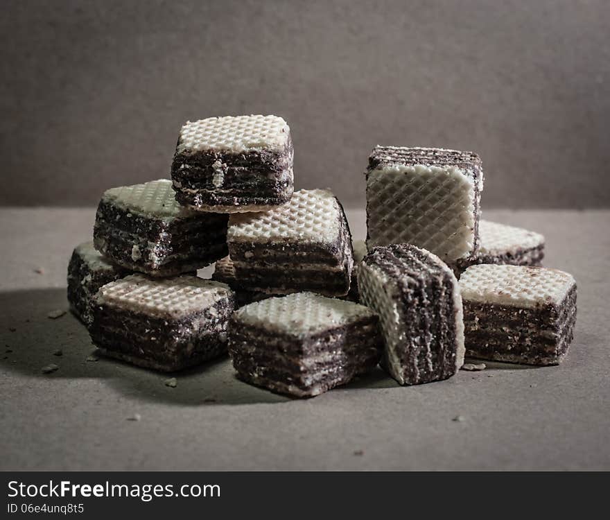 Stack of wafer in plate on dark background. Stack of wafer in plate on dark background.