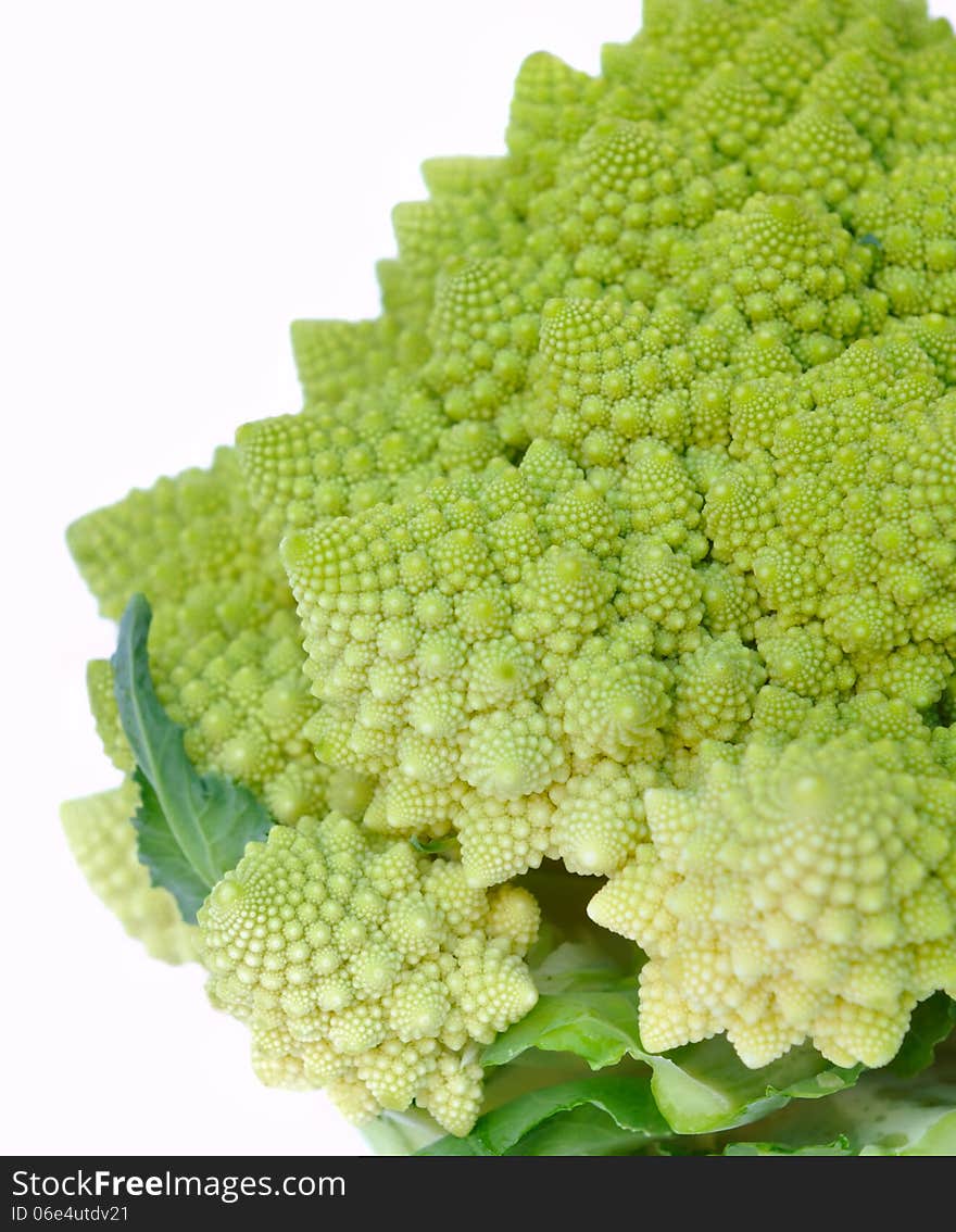 Close on the head of Romanesco cabbage on white background