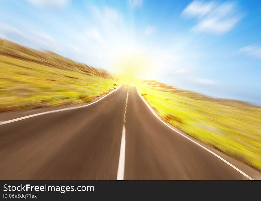 Asphalt road to the sun, Lanzarote, Spain