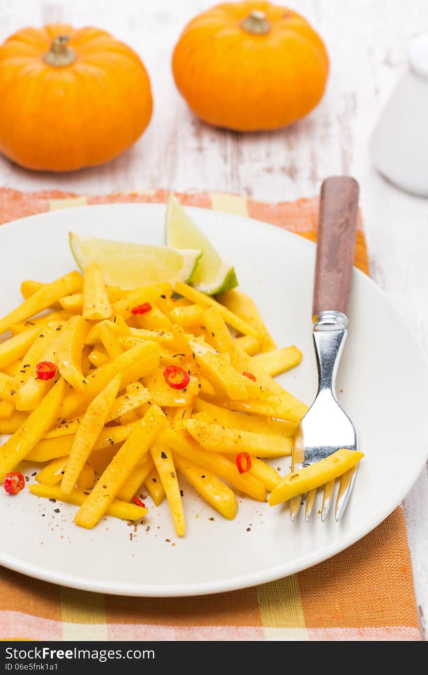 Salad Of Roasted Pumpkin With Lime And Chilli On The Plate