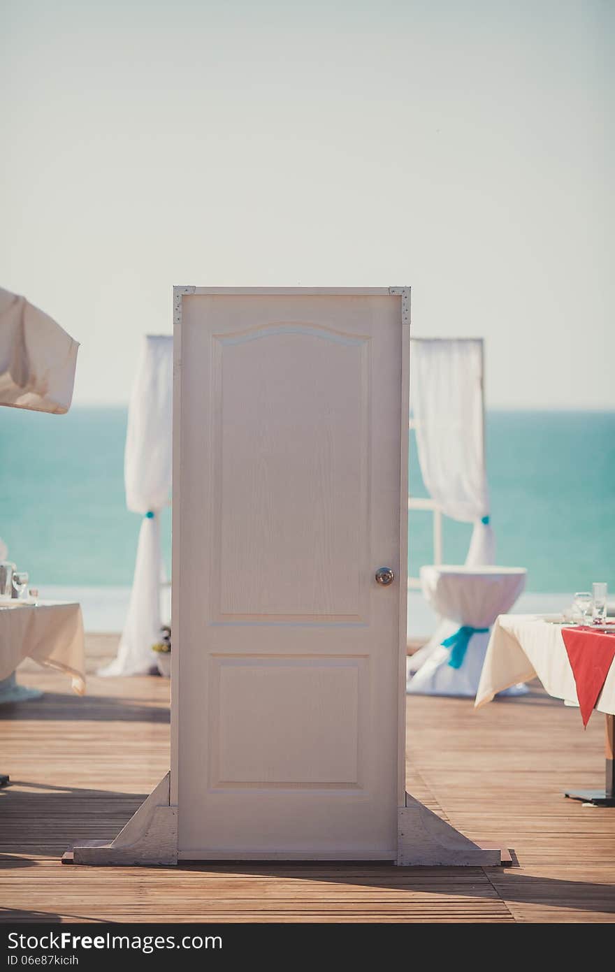 An image of a place setting at an elaborate wedding reception. An image of a place setting at an elaborate wedding reception