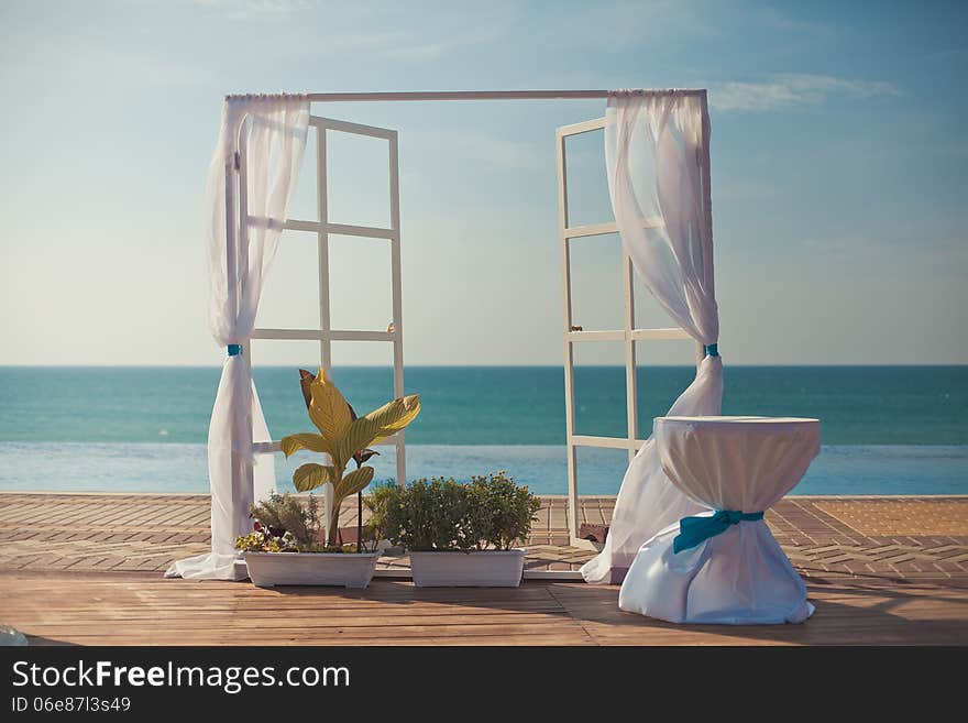 An image of a place setting at an elaborate wedding reception. An image of a place setting at an elaborate wedding reception