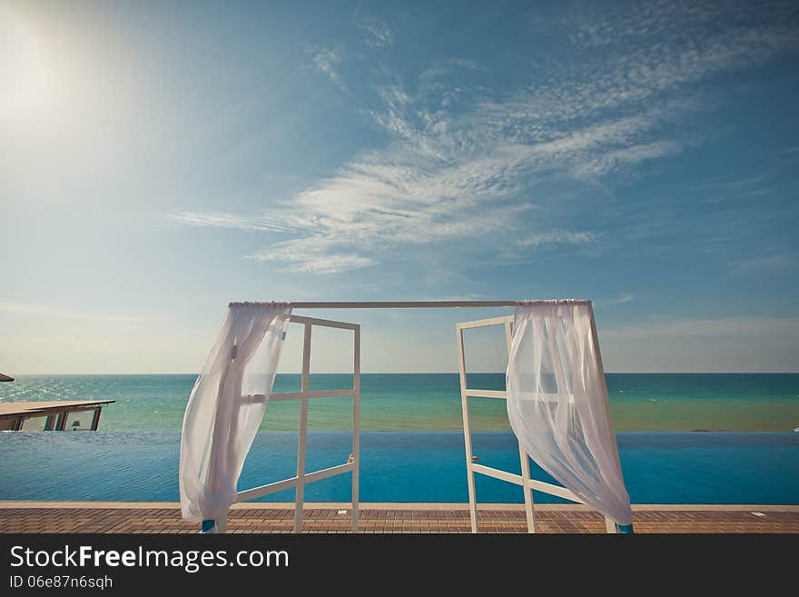 An image of a place setting at an elaborate wedding reception. An image of a place setting at an elaborate wedding reception