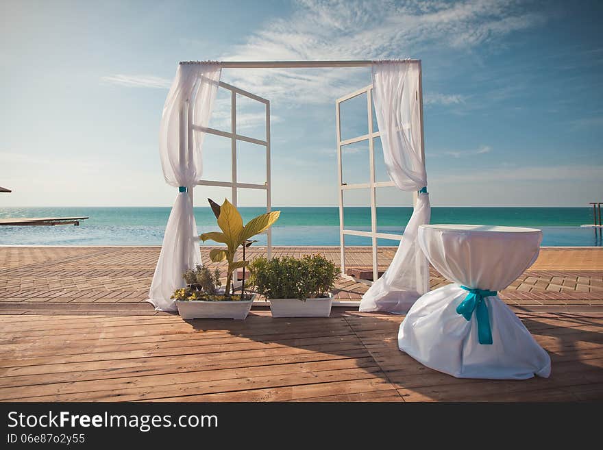 An image of a place setting at an elaborate wedding reception. An image of a place setting at an elaborate wedding reception