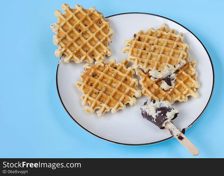 Plate Of Waffles On Light Blue Background