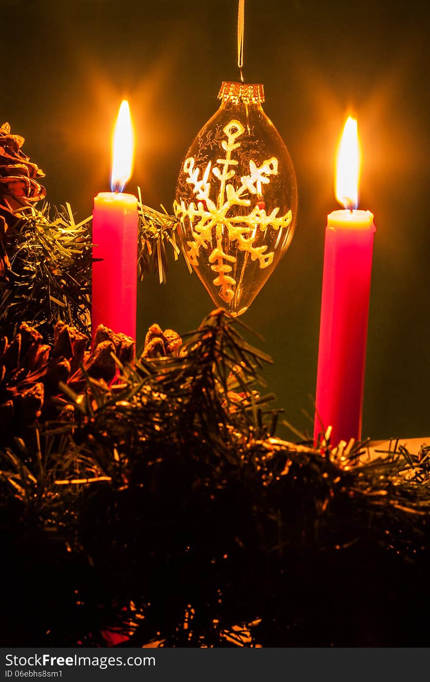 Candles Burning with a Christmas decoration