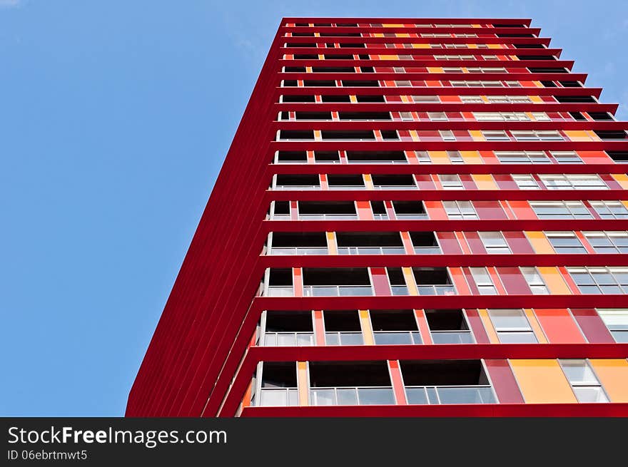 New modern architecture red apartment building. New modern architecture red apartment building.