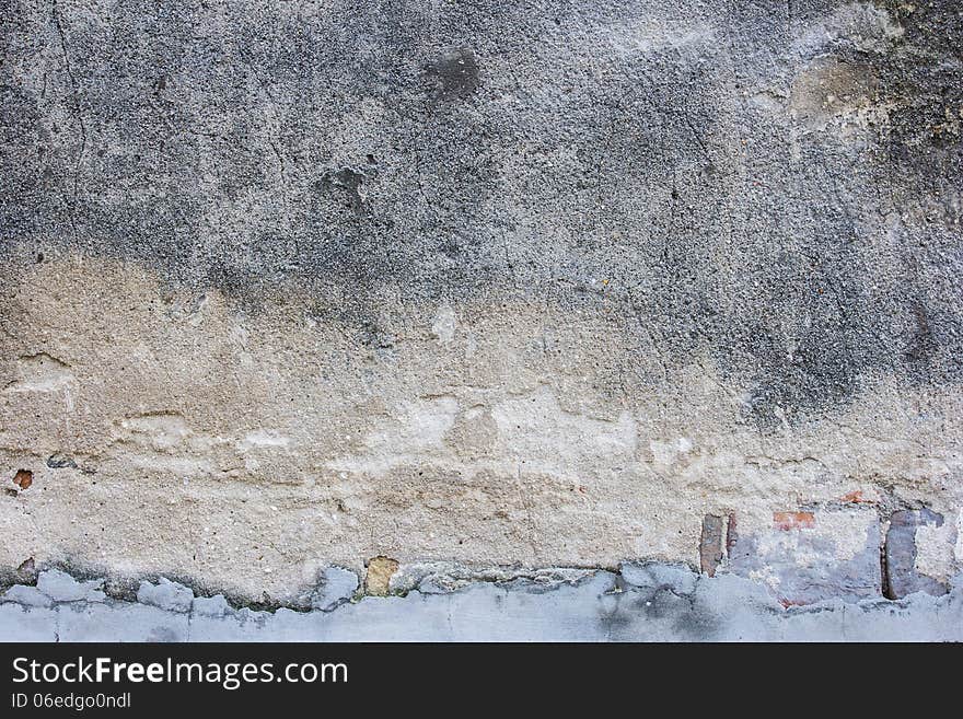 This is gray deep uneven plastered wall. This is gray deep uneven plastered wall