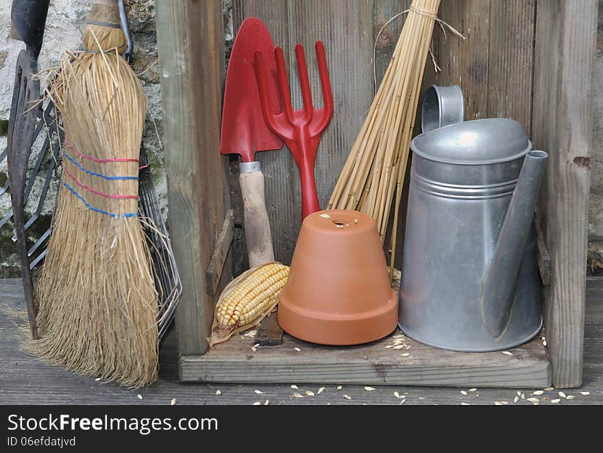 Equipment and gardening tools in a rustic setting